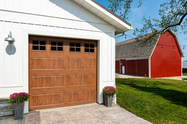 faux wood look garage door with windows